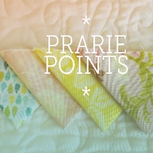 prairie points on a cream quilt 