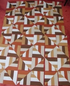 jelly roll patchwork with light and dark brown