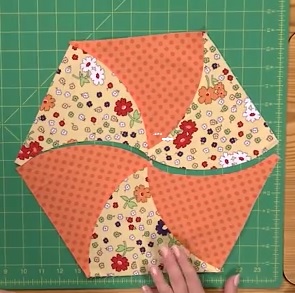 sew twisted triangles together