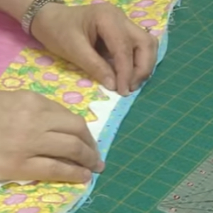 add rick rack when binding a quilt with a sewing machine