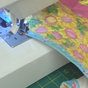 how to bind a quilt with a sewing machine stitiching the binding