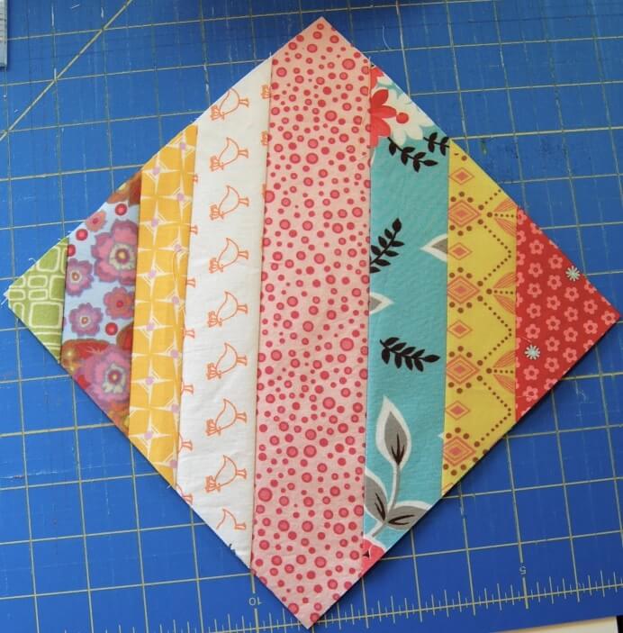scrappy quilt block made from strips of fabric