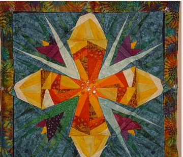 Quilt Pattern With Buttoned Flaps opening flower