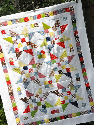 colorful scrappy star quilt
