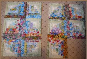 floral fabric log cabin quilt