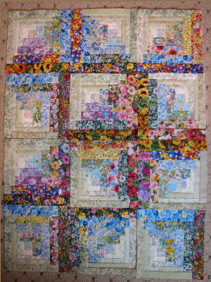 floral fabric watercolor log cabin quilt