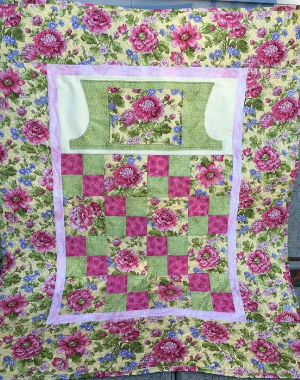 lovie lap quilt with pockets floral fabric
