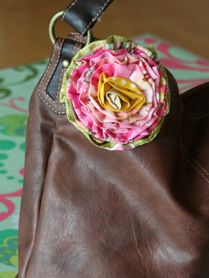 pretty scrappy rose on a handbag