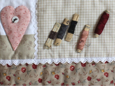sewing room wall quilt heart applique