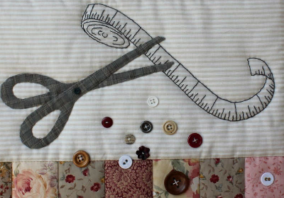 sewing room wall quilt scissors and tape measure