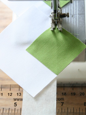 use painters tape stuck to a sewing machine to sew straight lines