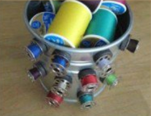 diy bobbin storage tin can with magnets