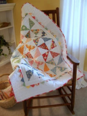 lap quilt pattern uses one charm pack