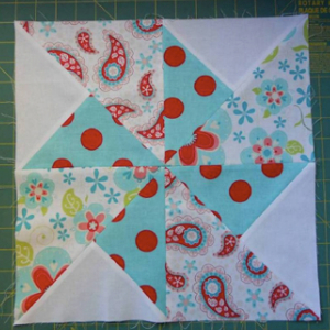 pinwheel block for pinwheel in the park quilt pattern