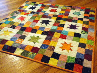 twinkle star baby quilt with nine patch blocks