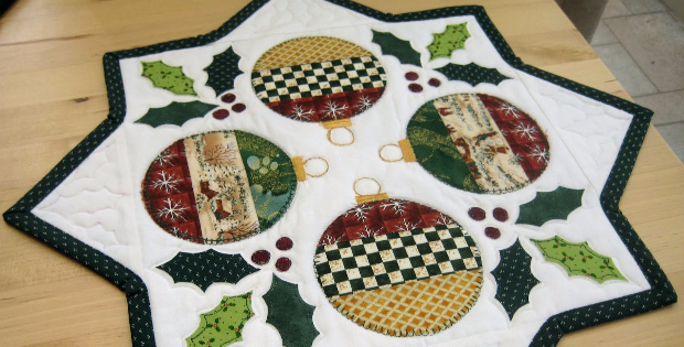 holly table topper with Christmas ornaments