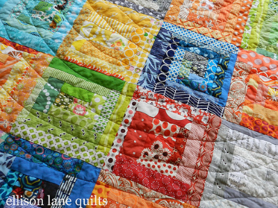 improv log cabin quilt quilted in circles