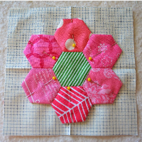 make a hexagon quilt flower on mini charm square