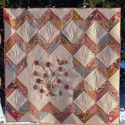 chevron-wall-quilt-with-appliques-bird-and-ruched-flowers