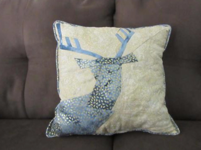 blue-reindeer-throw-pillow-spring-deer