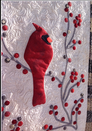 Cardinal applique against Grunge background