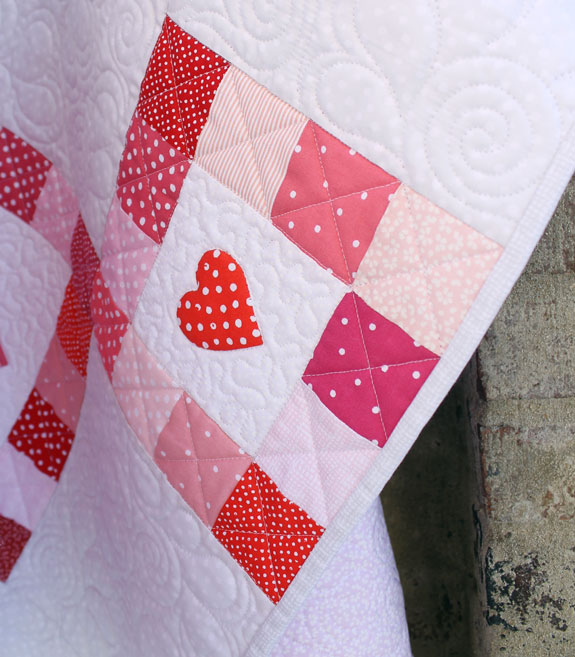 hearts chain quilt with two and half inch squares and appliqued hearts