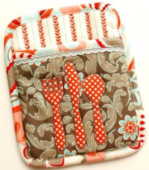 retro style pot holders with orange polka dot silver ware