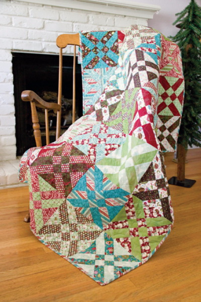 Arrowhead quilt with adjustable size blocks