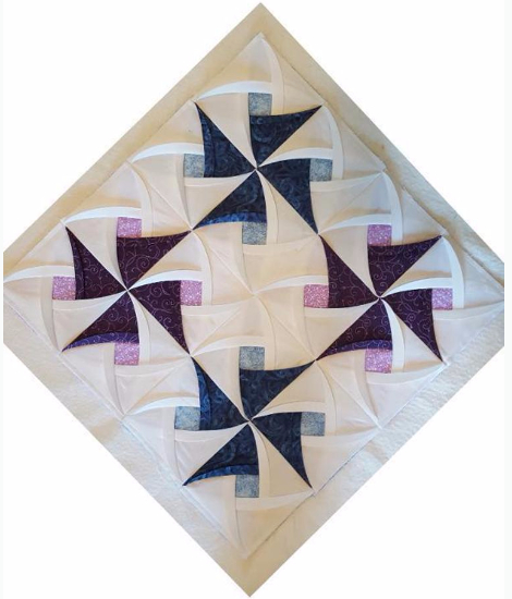 Pinwheel Surpise wall quilt idea On Point