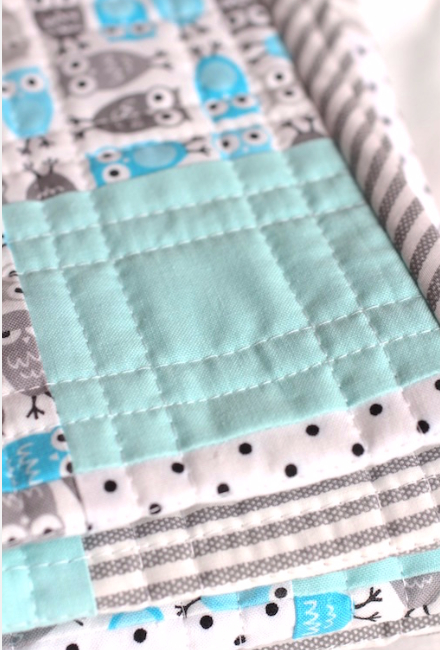 Zoology owl baby quilt with pin dots