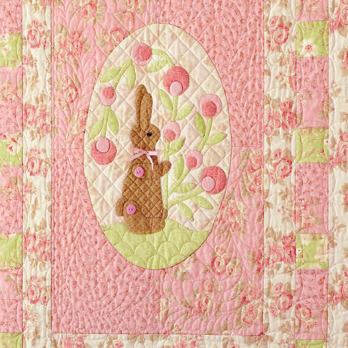 bunny wall quilt with appliqued flowers
