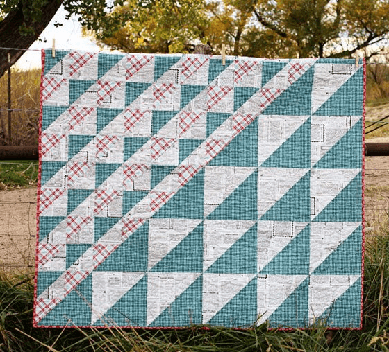 farm girl quilt pattern with newsprint fabric