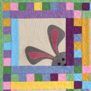 bunny wall quilt with peeping bunnies