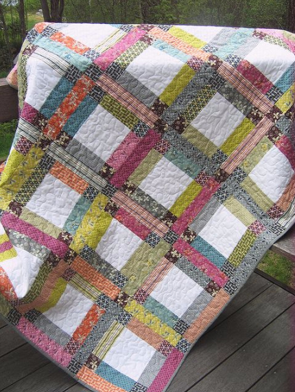 scrap quilt using jelly roll strips
