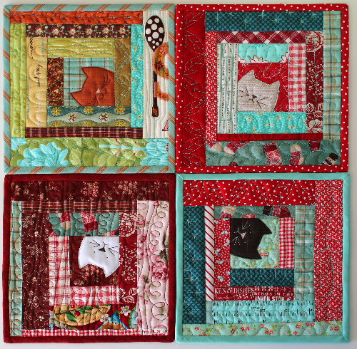 set of potholders cats