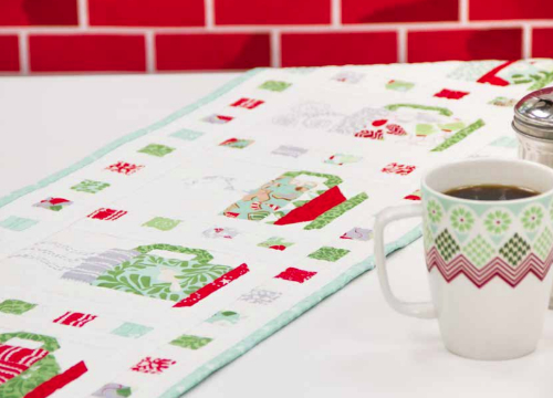 Kate Spain In From Cold cups table runner pattern