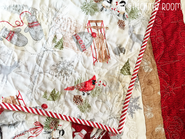 strip quilt pattern with Red rooster fabric Winter Celebration