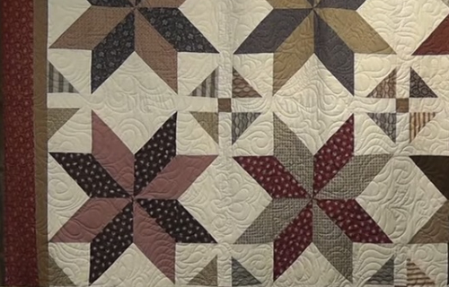 Dashing stars half square triangle quilt