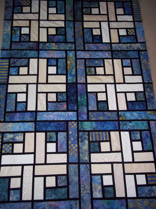Batiks Make A Stunning Stained Glass Log Cabin Quilt With Clever Fabric ...