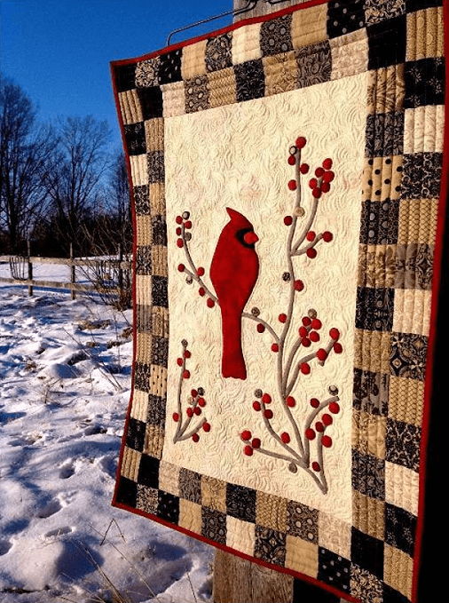 red bird and berries winter quilt