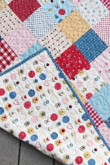 charm square baby quilt
