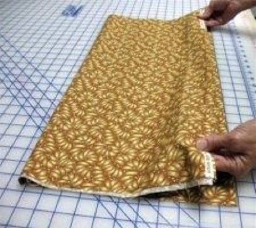 how to fold fabric to square up