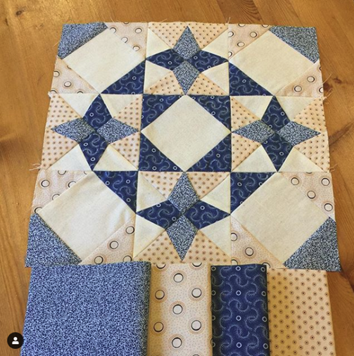 blue north quilt block with four fabrics