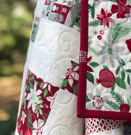 christmas quilt with charm squares