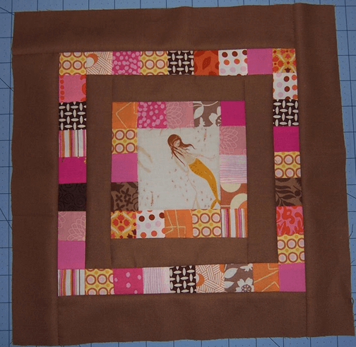 feature fabric in a quilt block