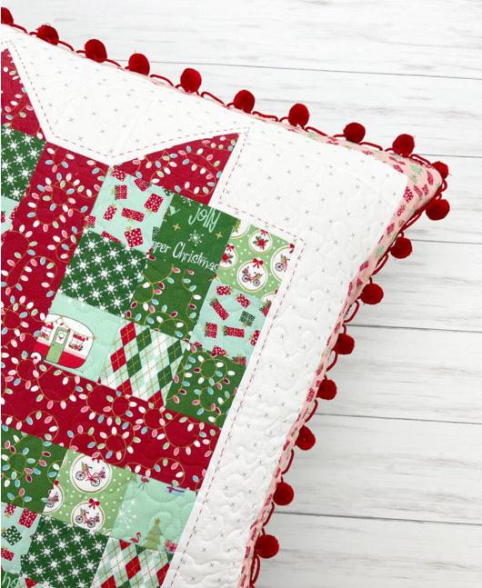 Christmas pillow patchwork with pom pom trim