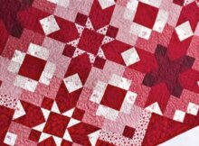 Red and white fabric Christmas quilt