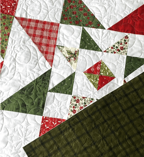 Star in a star quilt Christmas fabric